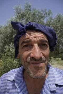 An authentic, full-length portrait of an elderly farmer. 写真素材