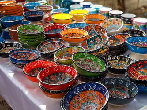 Authentic hand made Turkish ceramic bowls with vibrant bright colours and int Stock Photos