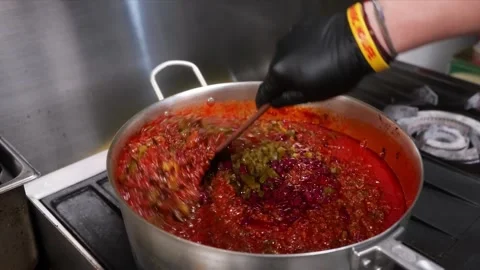 Authentic Homemade Harissa Paste Cooking in Pot Stock Footage 331634371