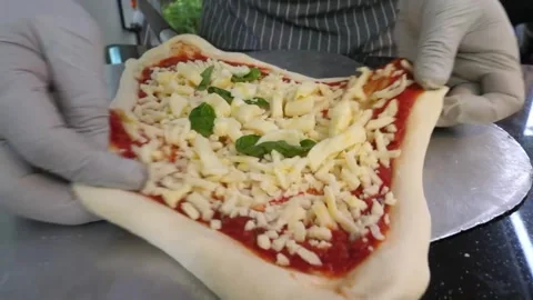 Authentic Italian Pizza Making Chef Placing Fresh Margherita on Peel for Oven Ba Stock Footage 337677075