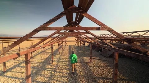 Authentic Man Walking Into Vanishing Point Through Symmetrical Wooden Frame.. 스톡 동영상 330857436