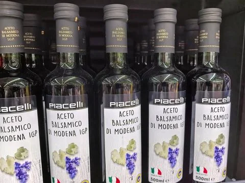 Authentic Modena balsamic vinegar displayed in elegant glass bottles Stock Photos