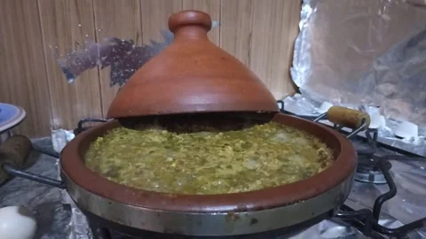 Authentic Moroccan Meatball Tagine with Eggs, Kefta , 4K Slow Cooking Stock Footage 332440309