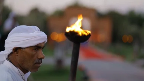 Authentic Moroccan show, decorative Knight on a horse Flaming Torch Stock Footage 81373106