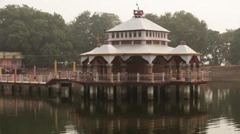 Authentic Natural Temple in  middle of holy river  in India Stock Footage 55556881