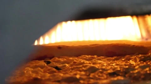Authentic Neapolitan Margherita pizza baking in a traditional wood-fired stone o Stockbeeldmateriaal 337676764