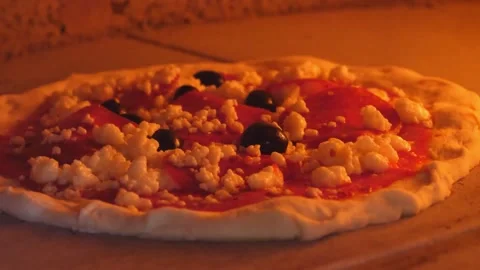 Authentic Neapolitan Pizza Baking in Traditional Wood-Fired Stone Oven Stock Footage 337676637
