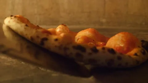 Authentic Neapolitan Pizza Baking in Traditional Wood-Fired Oven with Bubbling C Видео 337678574