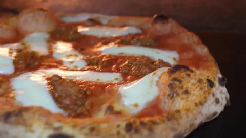 Authentic Neapolitan Pizza with Fresh Mozzarella and Sausage in Wood-Fired Oven Stock Footage 337678571