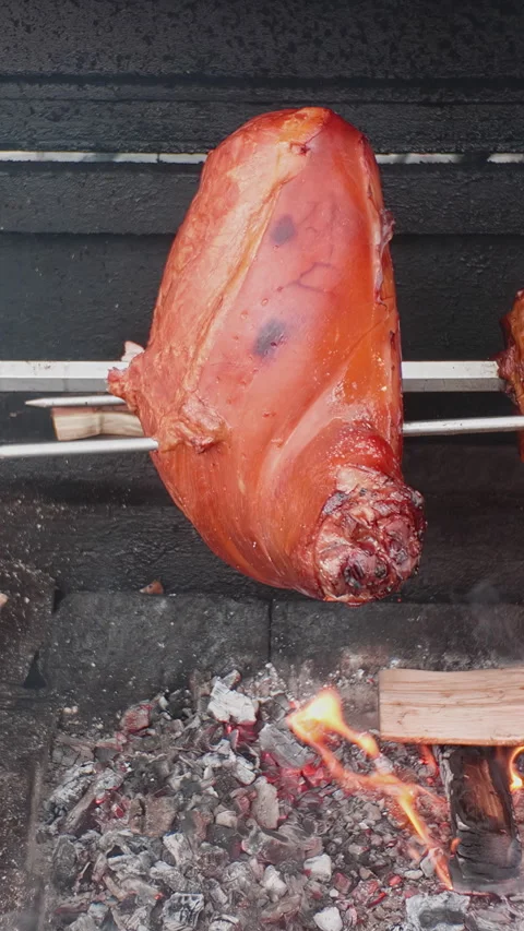 Authentic Old Prague ham, delicately smoked with beechwood and roasted on Stock Footage 325073585