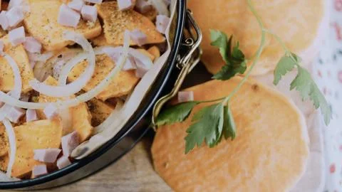 Authentic overhead composition: arranging the mixture in a baking dish Stock Photos