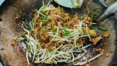 Authentic Pad Thai Cooking in Wok with Fresh Ingredients Stock Photos