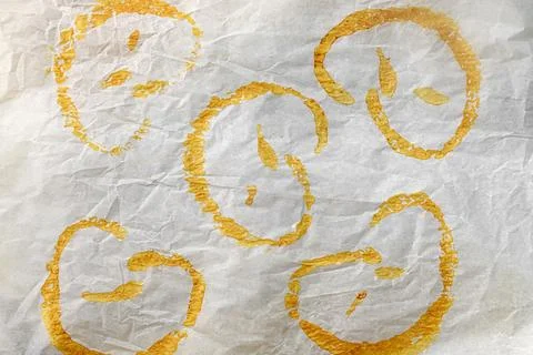 Authentic parchment baking paper with natural grease marks left by baked pr.. Stock Photos