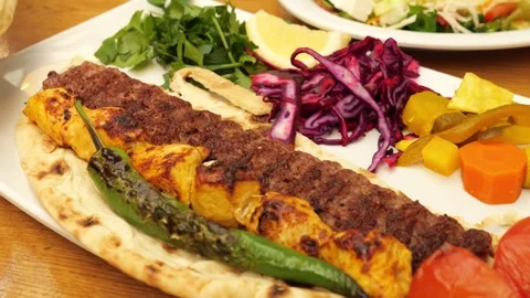 Authentic Persian Kebabs: Koobideh and Joojeh Recipe Stockbeeldmateriaal 333474190