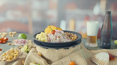 Authentic Peruvian Ceviche with Fried Seafood and a Glass of Cold Beer Stock Footage 338341132