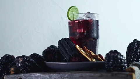 Authentic Peruvian Chicha Morada Drink, Purple Corn Drink with Lime and Cinnamon 스톡 동영상 344175484