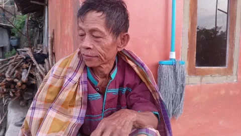 Authentic portrait of an elderly Indonesian. Stock Footage 317985930