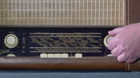 Authentic radio receiver from the 70s-60s. Tuning to a wave, turning on and.. Stock Footage 302787679