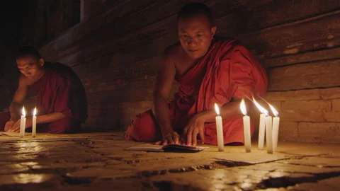Authentic real monks In Bagan Mayanmar / Burma  reading and studying religious s Stock Footage 199476451