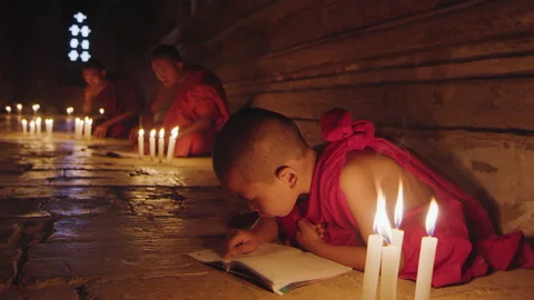 Authentic real monks In Bagan Mayanmar / Burma  reading and studying religious s 스톡 동영상 201094087
