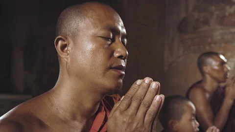 Authentic real monks In Bagan Mayanmar / Burma doing meditation in ancient templ Stock Footage 201096362