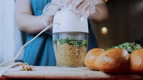 Authentic recipe demonstration: grating beetroot into a fine texture Stock Photos