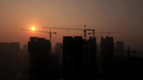 Authentic Recording of Construction Site with Towering Crane Stock Footage 319610721