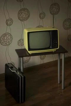 Authentic retro Soviet portable analog TV and attache case, vertical image 스톡 사진