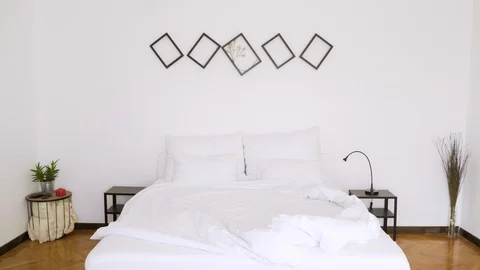 Authentic room with undone bed and every day itens on the table. Stock Footage 102654056