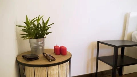 Authentic room with undone bed and every day itens on the table. Stock Footage 102657496