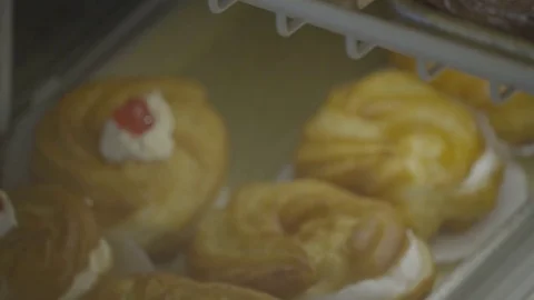 Authentic Sfogliatella cookies in a display case Stock Footage 73903769