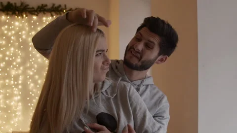 Authentic shot of young happy smiling married couple is enjoying time together Stock Footage 164983609