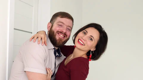 Authentic shot of young happy smiling married couple is enjoying time together Stock Footage 180408656