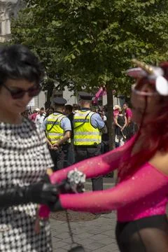 An authentic snapshot of unity and celebration on lively parade thoroughfare Stock Photos