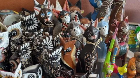 Authentic souvenirs on the counter in the store Stock Footage 240184686