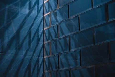 Authentic stylized designer brick like mirror reflecting light, colorful inte Stock Photos