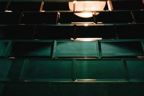 Authentic stylized designer brick like mirror reflecting light, colorful inte Stock Photos