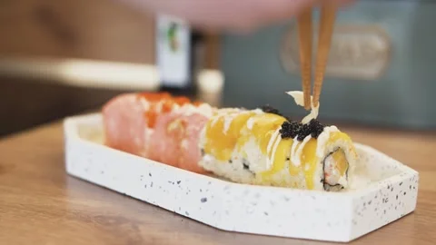 Authentic Sushi Making:Master Chef Prepares Rolls with Ginger Topping Stock Footage 306658772