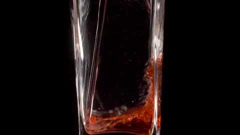 Authentic Taste. Super slow motion shot of pouring pomegranate juice into a Stock-Footage 147415124