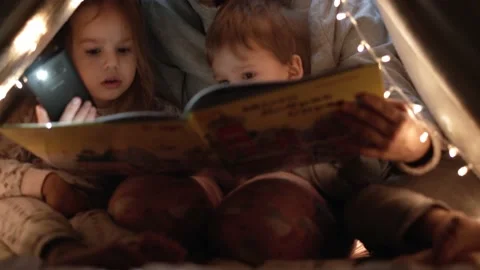 Authentic tender cute mom and preschool kids boy and girl in tent at home. young Stock Footage 146551939