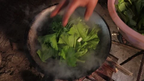 Authentic Thai Rural Cooking with Fresh Green Vegetables in Iron Wok Stock Footage 340248016