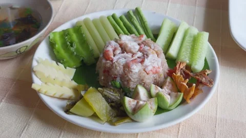 Authentic Thai Shrimp Paste Fried Rice with Fresh Vegetables Stock Footage 335520447
