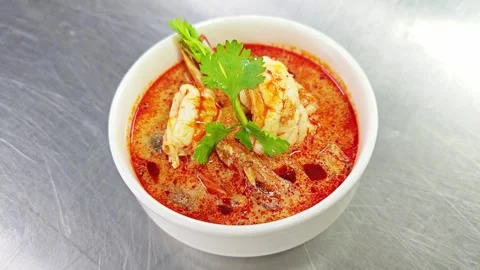 Authentic Thai Tom Yum Goong creamy spicy shrimp soup. Stock Footage 342393881