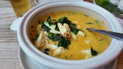 Authentic Thai Yellow Curry With Crab Meat Served In A White Bowl At A Stockbeeldmateriaal 333218655