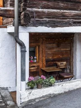 Authentic Traditional Alpine Stone and Timber Buildings in Historic Swiss M.. Stock Photos