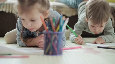 Authentic two happy sibling toddler creative kids with mom draw by pencils Stock Footage 148891785