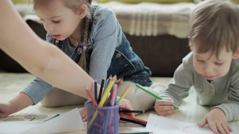 Authentic two happy sibling toddler creative kids with mom draw by pencils Stock Footage 148964367
