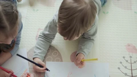 Authentic two happy sibling toddler creative kids with mom draw by pencils Video stock 149079834