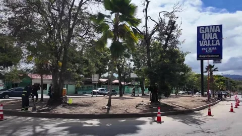 Authentic workforce renovating civic spaces and road infrastructure in Caracas Stock Footage 332116984