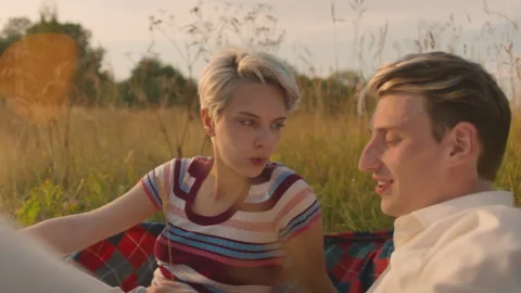 Authentic young couple on romantic picnic date Stock Footage 162545024